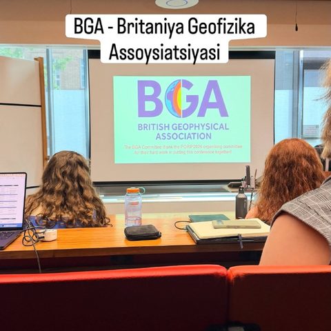 Conference room with a British Geophysical Association slide on the screen
